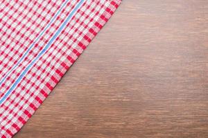 Tablecloth on wooden background photo