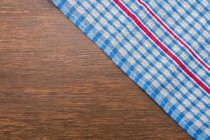 Tablecloth on wooden background photo