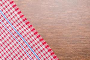 Tablecloth on wooden background photo