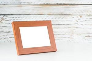 Frame on wood table photo