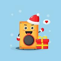 Cute speaker mascot wearing a Christmas hat vector
