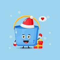 Cute bucket mascot wearing a Christmas hat vector