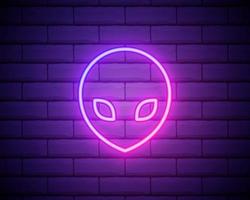 Glowing neon Alien icon isolated on brick wall background. Extraterrestrial alien face or head symbol. Vector Illustration