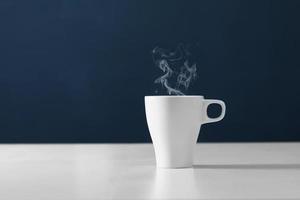 Steam coming out of a cup of tea photo