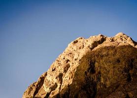 Rocky cliff and sky photo