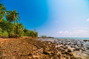 Beautiful paradise island with sea and beach landscape photo