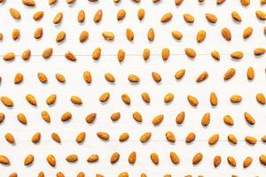 Almonds on white background photo