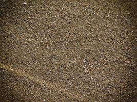parche de suelo rocoso o arena para el fondo o la textura foto