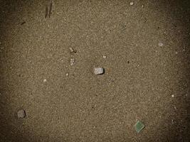 parche de suelo rocoso o arena para el fondo o la textura foto