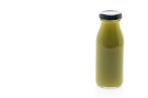 Kiwi juice bottle isolated on white background photo