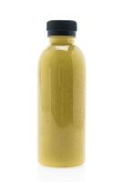 Kiwi juice bottle isolated on white background photo