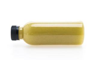 Kiwi juice bottle isolated on white background photo