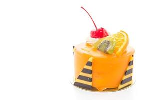 Orange fruit cake isolated on white background photo