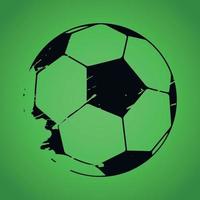 Balón de fútbol dibujado en negro sobre un fondo verde - vector