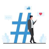 Man leaned against the large hash tag symbol holding a phone. vector