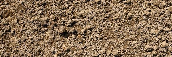 Background texture from the smooth surface of the earth soil