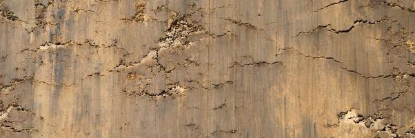 Textura de fondo de la superficie suelta del suelo de arena y tierra. foto