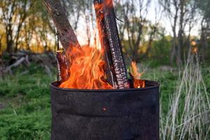 Burning garbage barrel photo