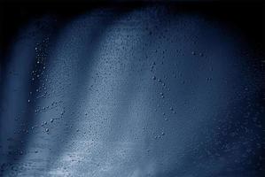 Abstract blue background with tiny bubbles photo