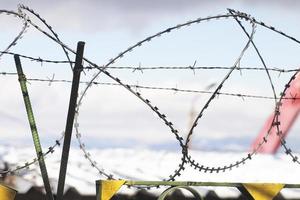 Barbed wire fence photo