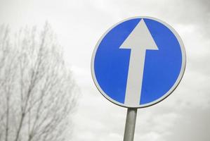 Blue road sign in the street photo