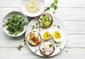 Sandwiches with healthy vegetables and micro greens photo
