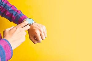 Man wears a smart watch in everyday lifestyle photo