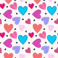 Repeated hearts drawn by hand. Scandinavian seamless pattern with colored cute love heart isolated on white background. Endless romantic. Vector illustration. Perfect for fabric or childish design