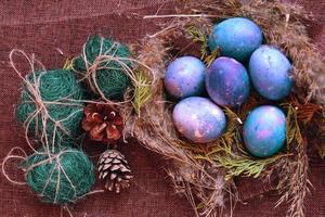 Easter eggs in the nest photo