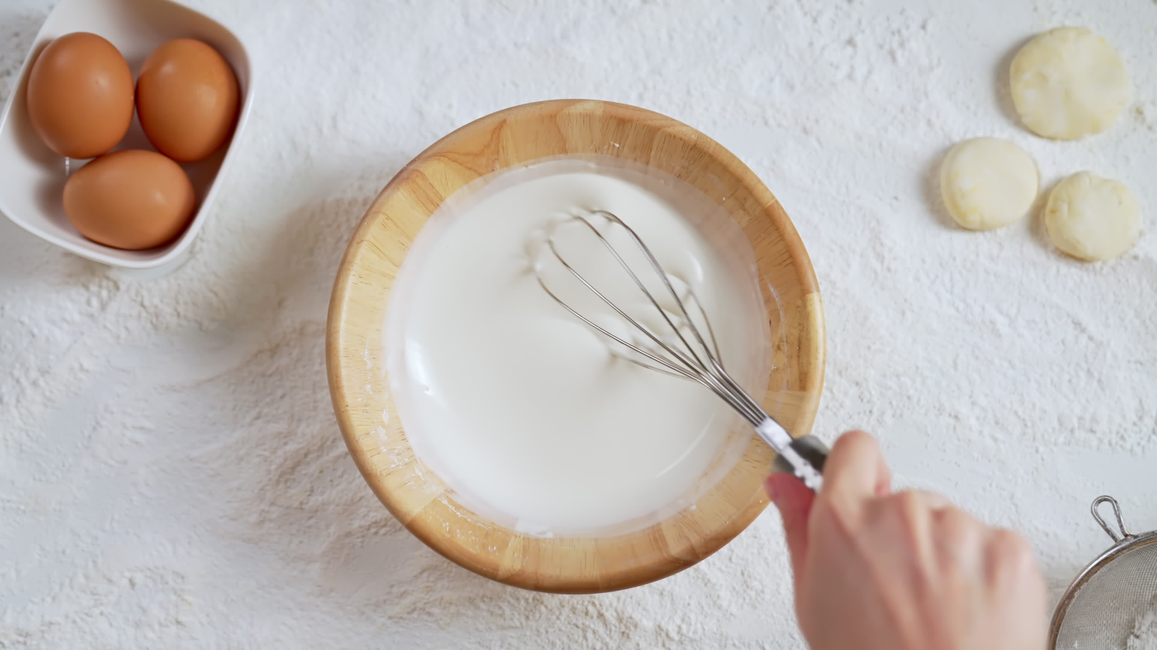 Closeup of Hand Whisking on Flour 2215848 Stock Video at Vecteezy