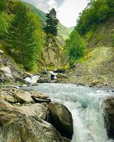 Mountains and river with scenic landscape in Khevsureti, Georgia photo