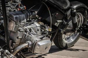 Old chopper motorcycle engine close up photo