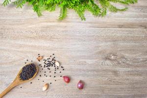 Wood spoon on a white wood background photo