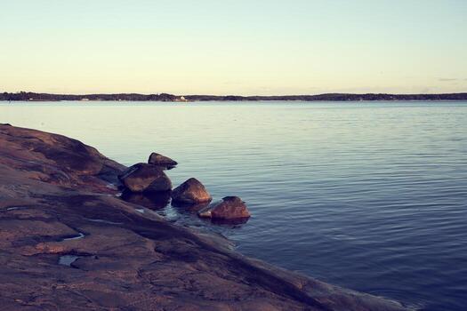 Rocky coast at sunset photo