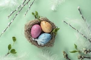 Easter background with pussy-willow painted eggs in the nest. Orthodox Easter, pussy-willow Sunday photo