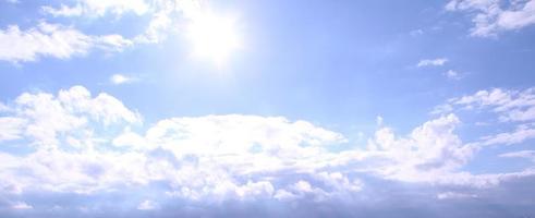 Bright sunny day with blue sky with white clouds photo