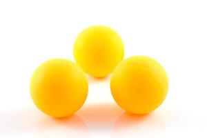 Table tennis orange balls isolated on white background photo