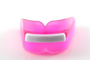 Boxers gum mouth guard shield for boxing isolate in a white background photo