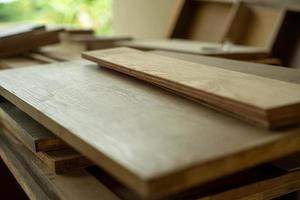 Selective focus on pile of wooden boards for installing photo