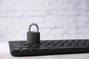 Padlock on computer keyboard photo
