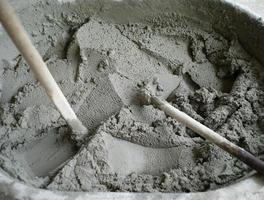 Abstract texture and background of mixed concrete for plastering the bricklayer wall photo