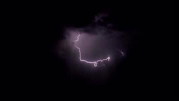 Realistic lightning on black background. video