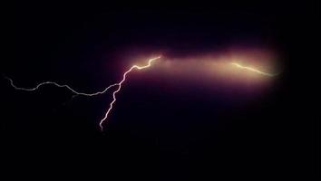 Realistic white lightning on black background. video