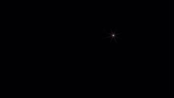 Lluvia de meteoros de luz blanca realista con fondo negro. video