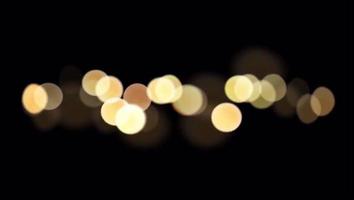 Realistic orange light bokeh blur on black background. video