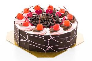 Chocolate cake with cherry on top photo