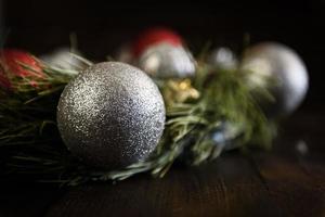 Christmas wreath of fir branches with Christmas decorations photo