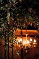 Wedding ceremony area with wood and rusty metal photo