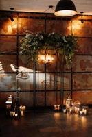 Wedding ceremony area with wood and rusty metal photo