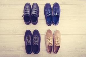 Leather shoes on wooden background photo